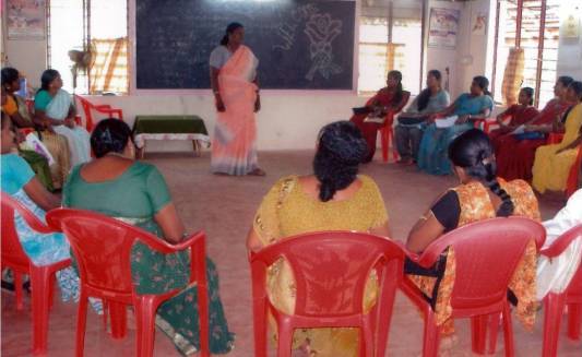 Women's SHG savings meeting in a coastal village
